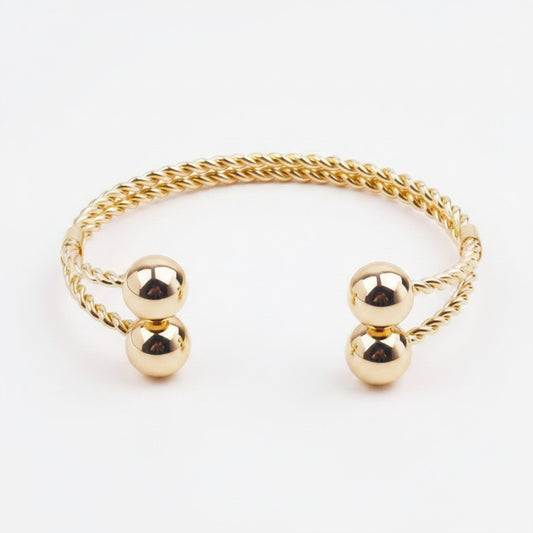 Brazalete Torque Trenzado con Esferas – Baño de Oro