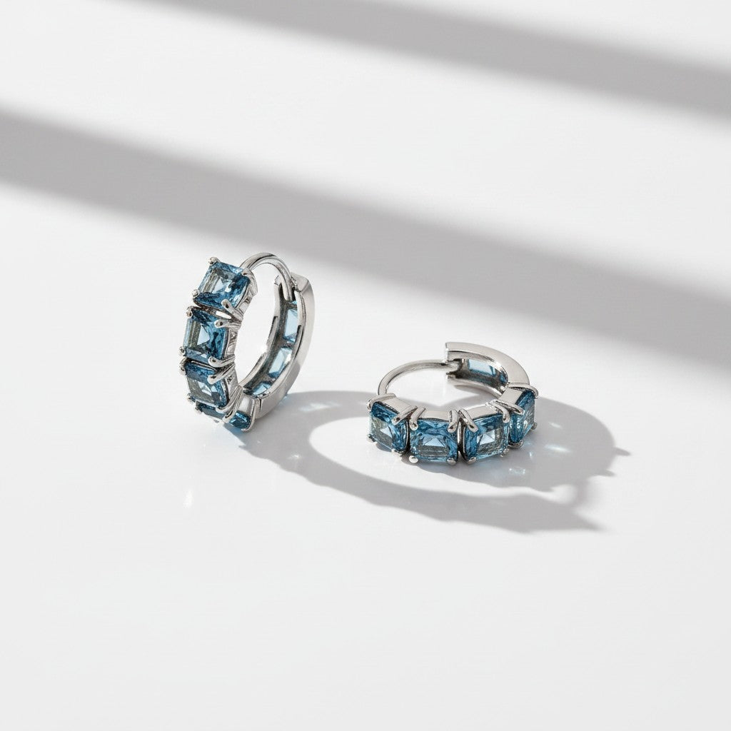 Argollas Circonitas Celestes 12mm – Baño de Rodio