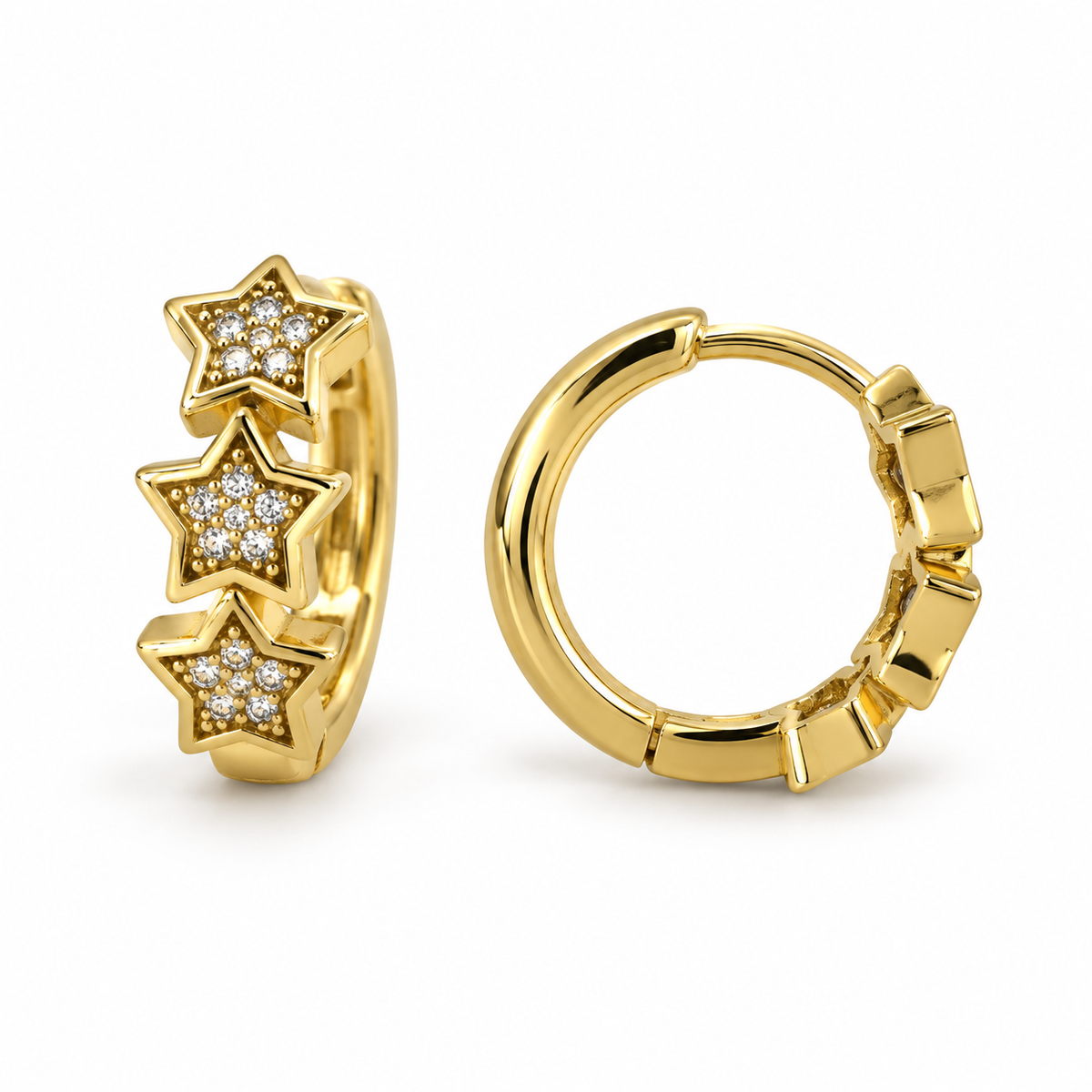 Argollas doradas con tres estrellas de circones