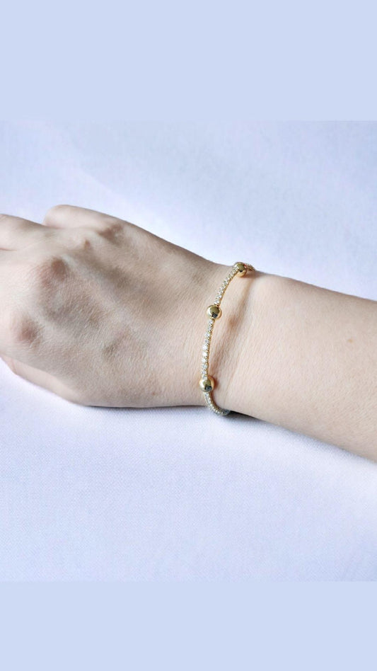 Pulsera Ajustable Infinita Bolas Doradas