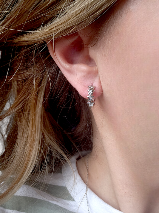 Argollas Estrellitas Acero - Ámbar Joyas