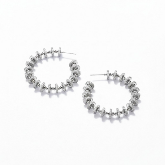 Argollas Orbit Pavé Baño de Rodio
