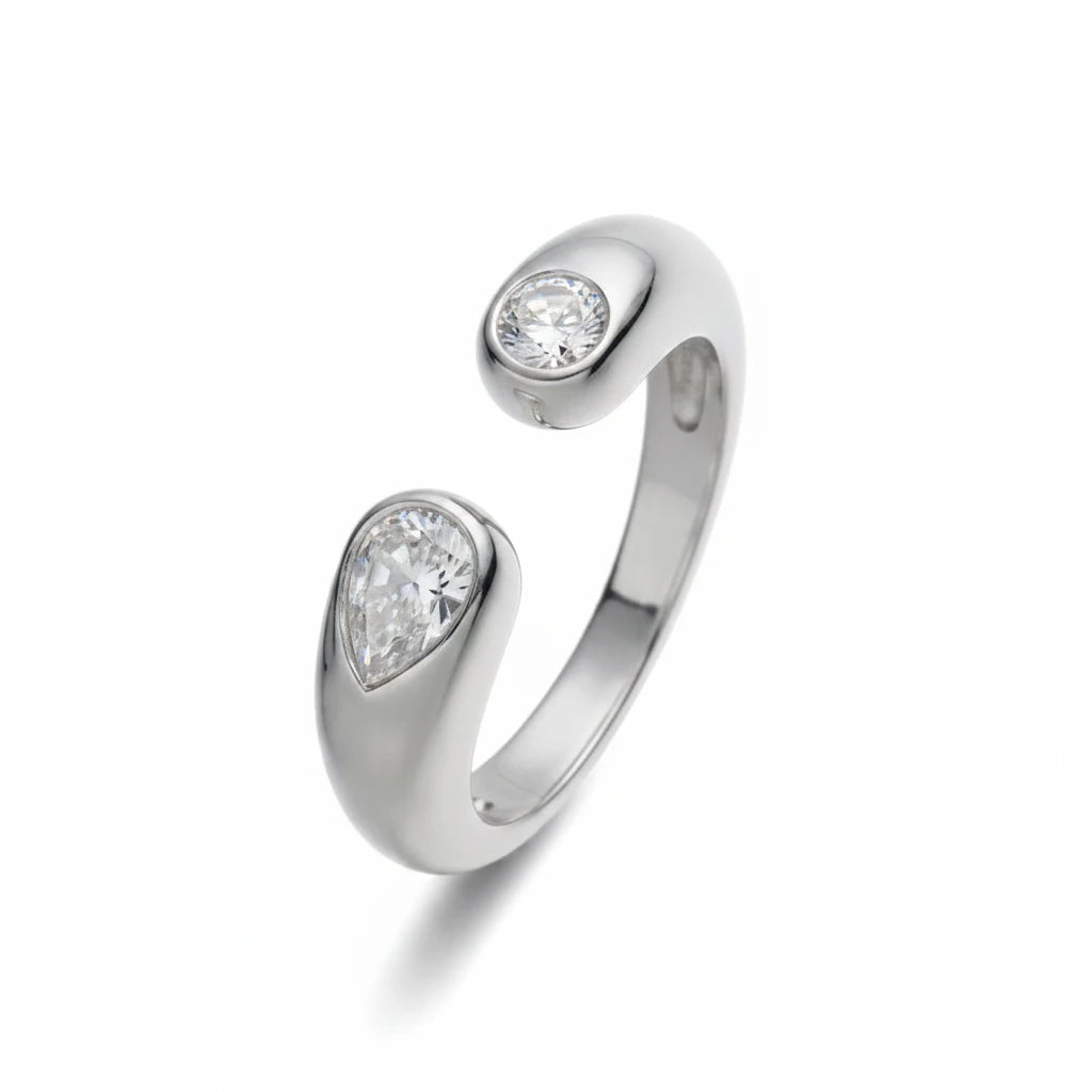 Anillo abierto Ámbar Joyas en tono plateado con dos circonitas blancas en forma de gota