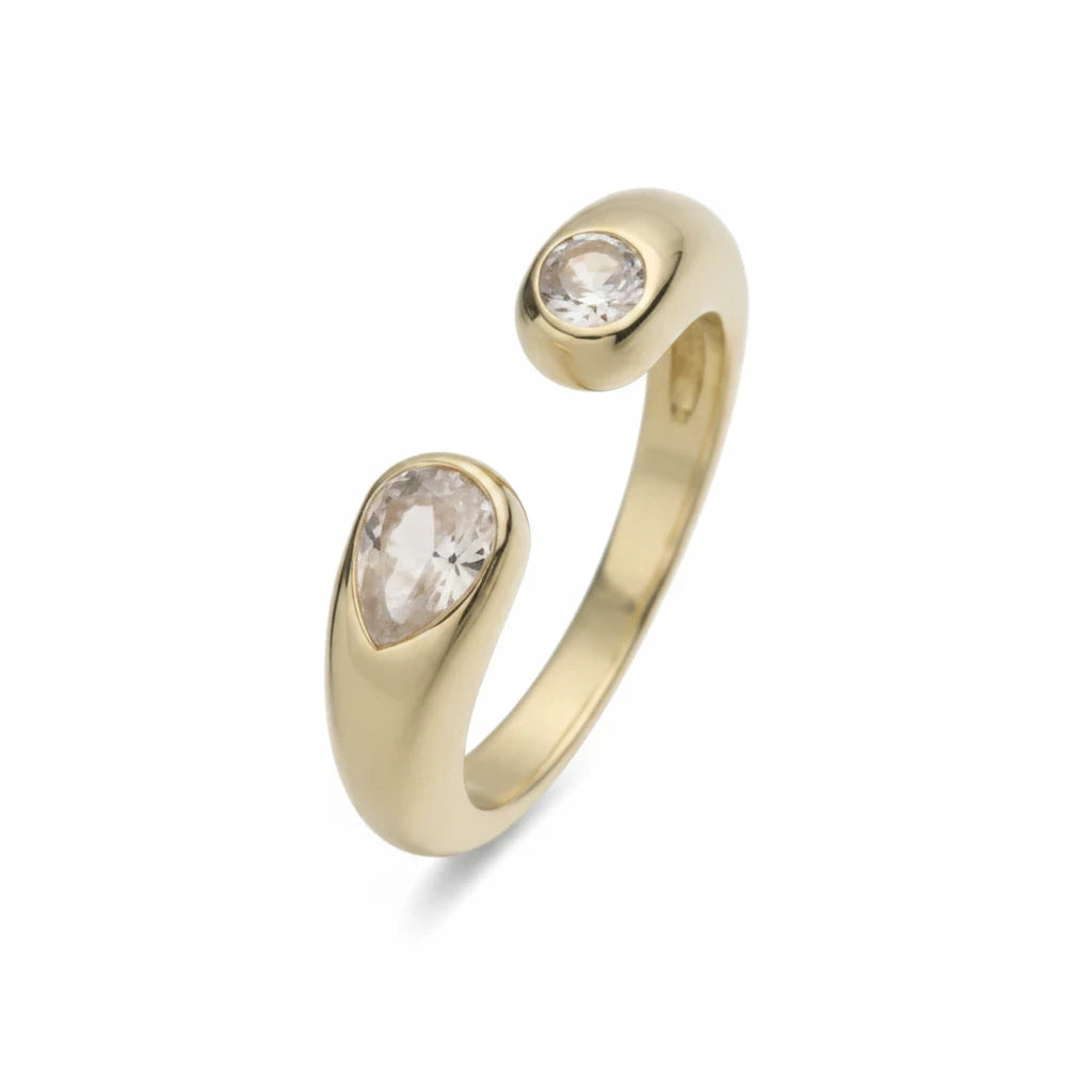 Anillo abierto Ámbar Joyas en tono dorado con dos circonitas blancas en forma de gota