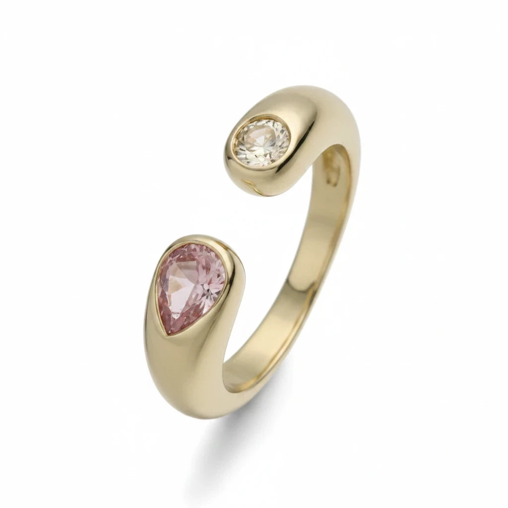 Anillo abierto Ámbar Joyas en tono dorado con circonitas en forma de gota rosa y transparente