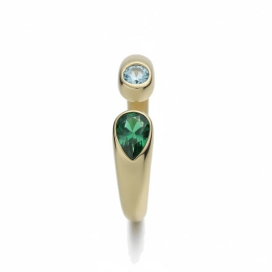 Anillo abierto Ámbar Joyas en tono dorado con circonita verde en forma de lágrima y circonita azul redonda