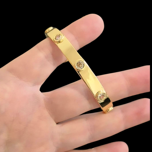 Esclava Ajustable Dorada con Circones